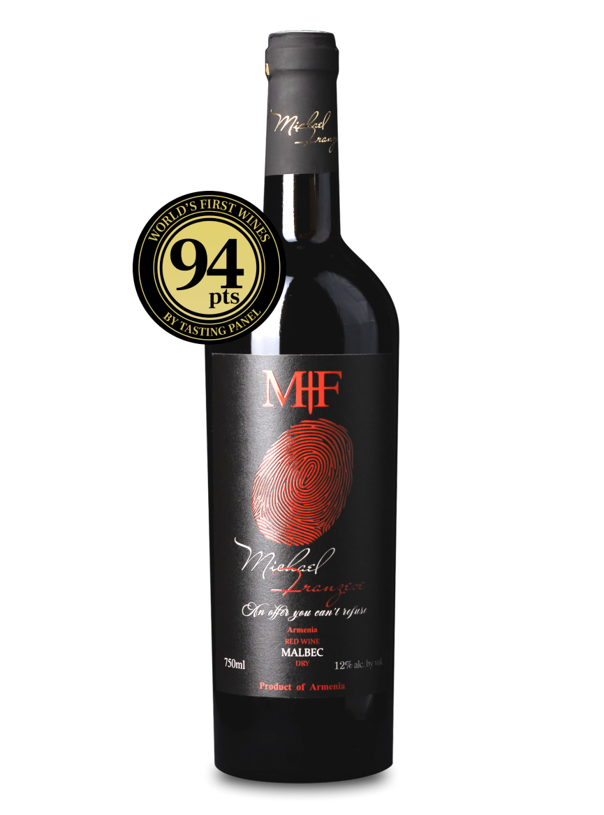Wine bottle with a label and a gold medal on a white background