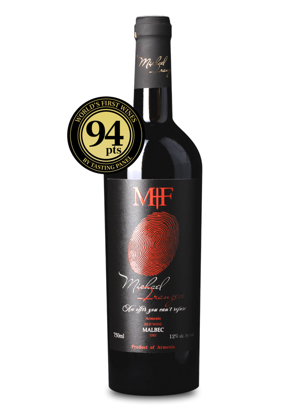 Wine bottle with a label and a gold medal on a white background